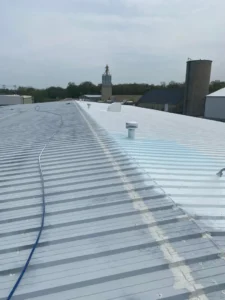 applied elastomeric roof coating sealing a roof deck