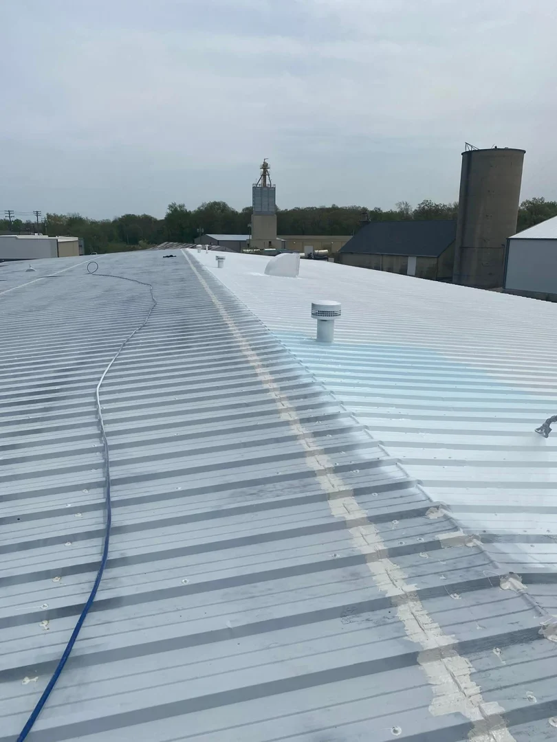 applied elastomeric roof coating sealing a roof deck