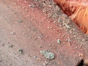ridge tiles with cracked mortar on a residential roof