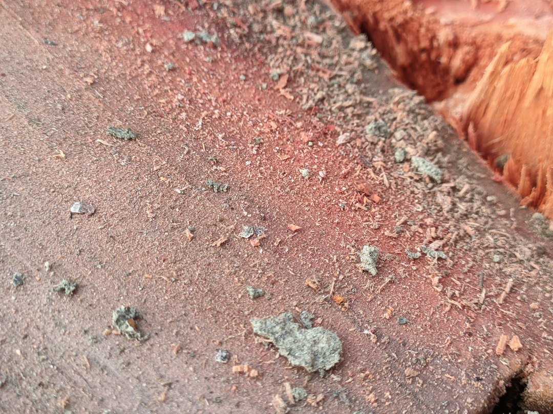 ridge tiles with cracked mortar on a residential roof